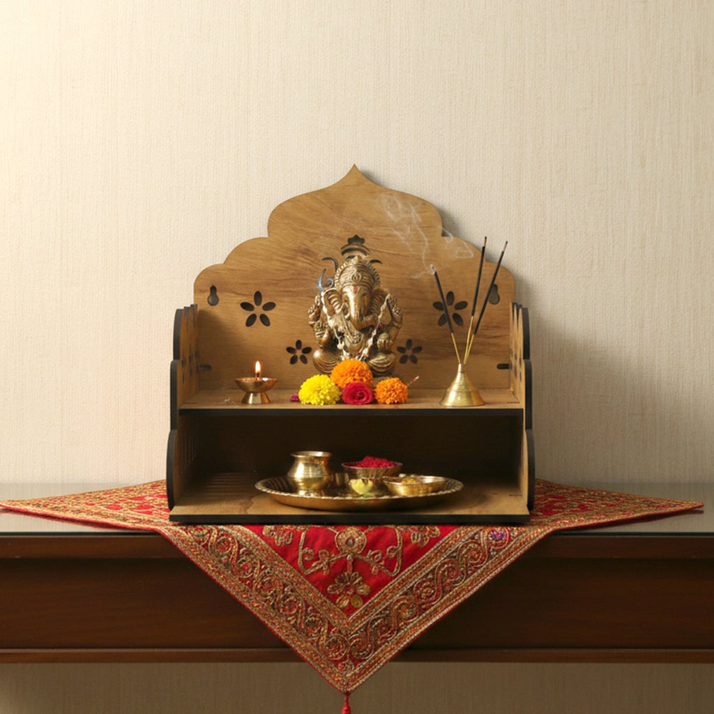 Wooden home mandir in use with pooja items