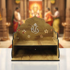 Wooden home mandir lit with a diya and agarbatti