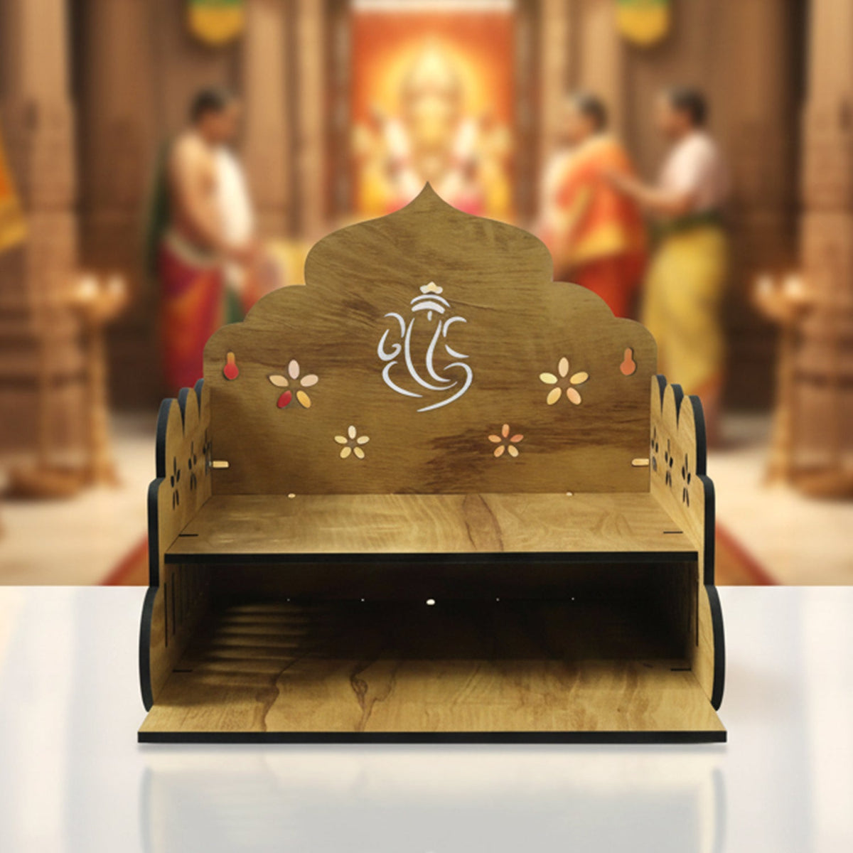 Wooden home mandir lit with a diya and agarbatti