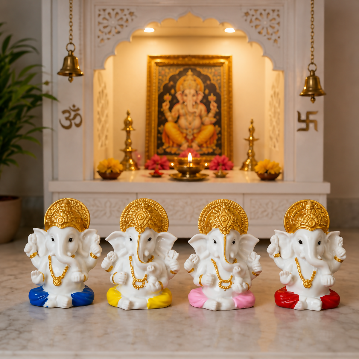 Set of four mini Ganesh idol showpieces
