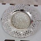 Swastik pooja thali held up