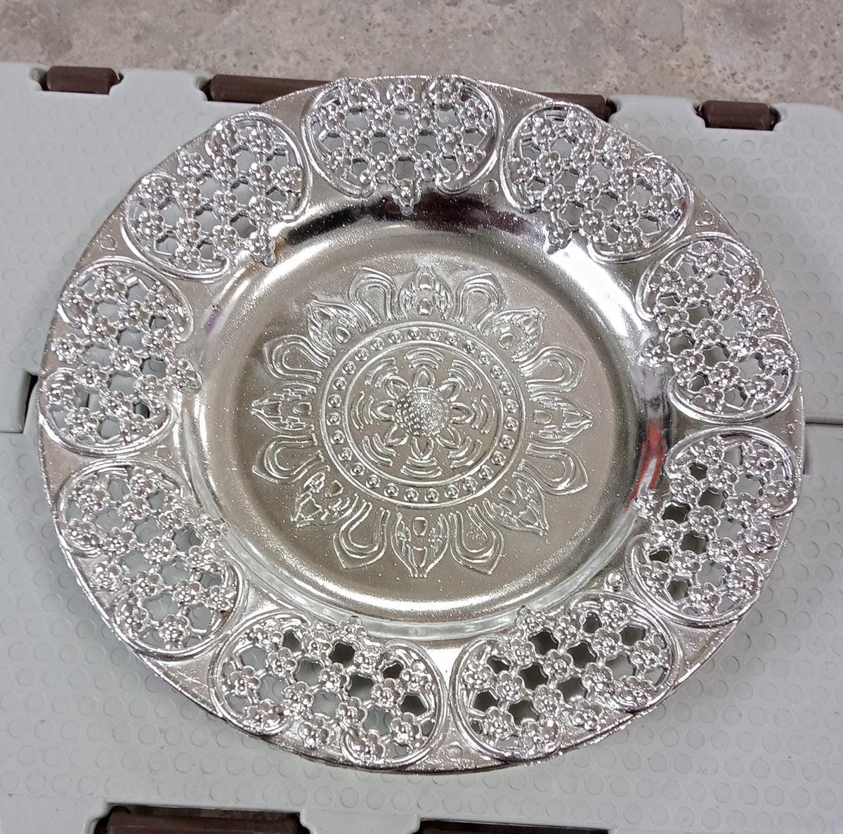 Swastik pooja thali held up